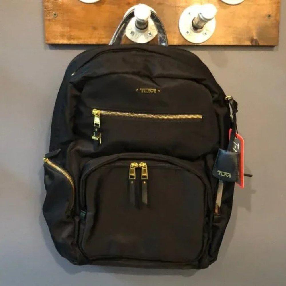 Like new with minimal signs of use. Tumi